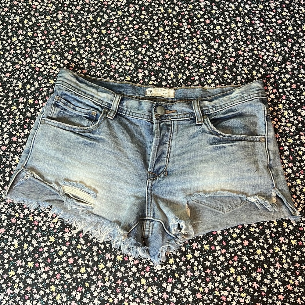 Free people low rise distressed shorts size 27